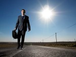 businessmanwalkingdownroad2